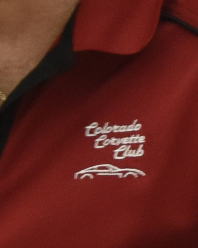 silhouette logo on red shirt